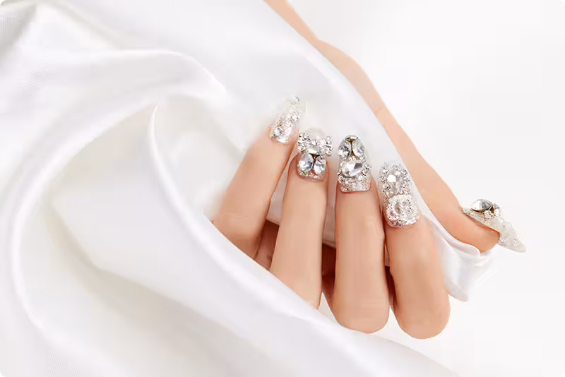Well-manicured hands with intricate nail art design
